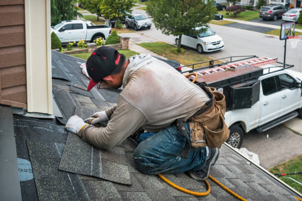 Professional Roofing technician working in Six Lakes, MI
